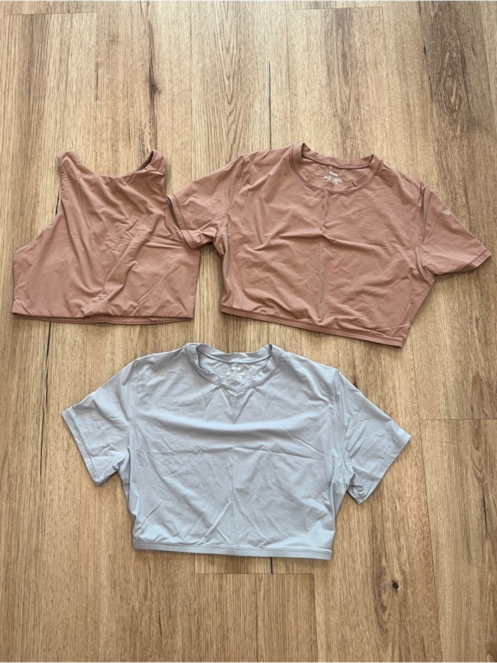 SKIMS Trio Cropped Tops in Dusty Pink and Light Blue